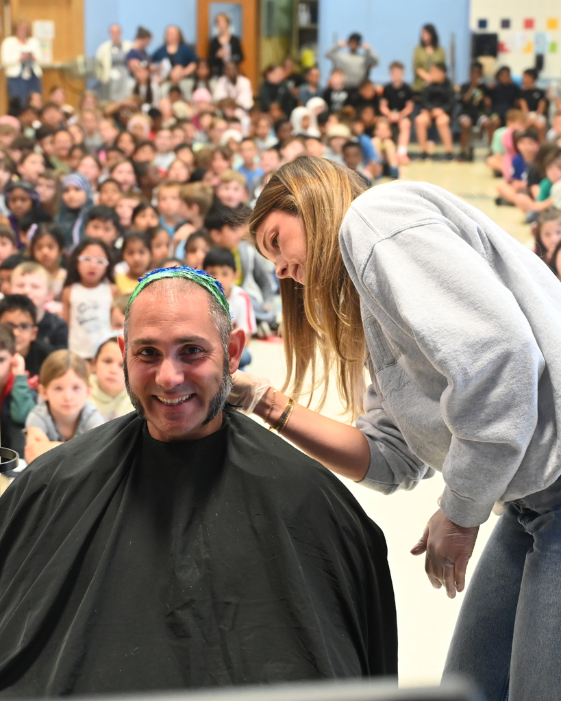 Mr. Turcio getting his hair painted
