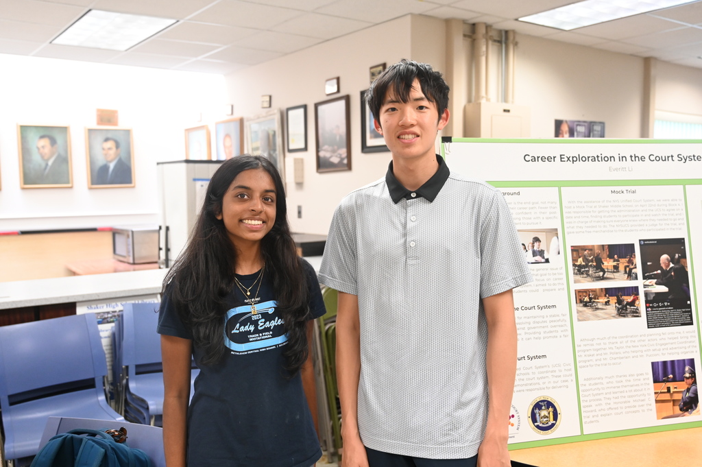 photo of two students standing together