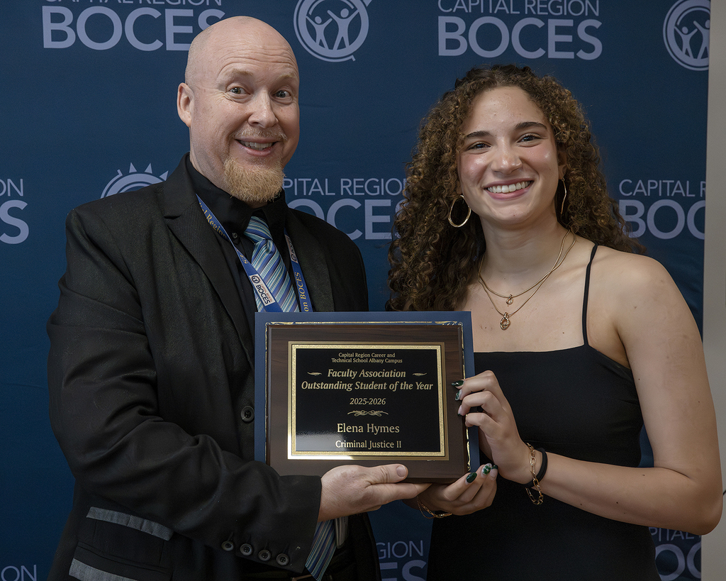 elena hymes a senior in the Criminal Justice program, pictured with teacher