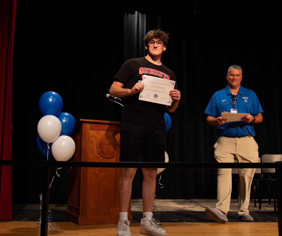 Senior shows certificate