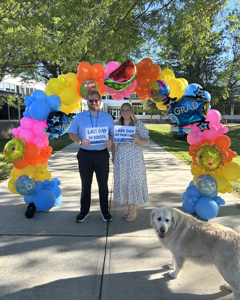 SHS LaFollette Dean Garrett Couture and Taft Hall Dean Morgan Flynn with Ms. Flynn's dog Charlie