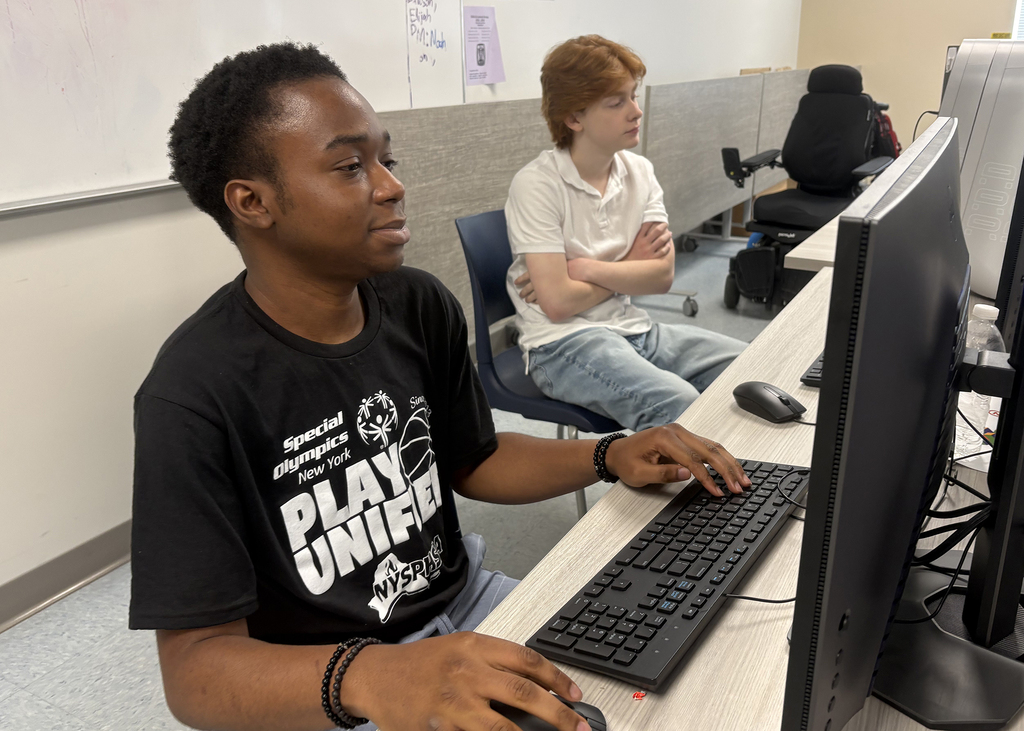 Bolaji Owodunni working on the computer