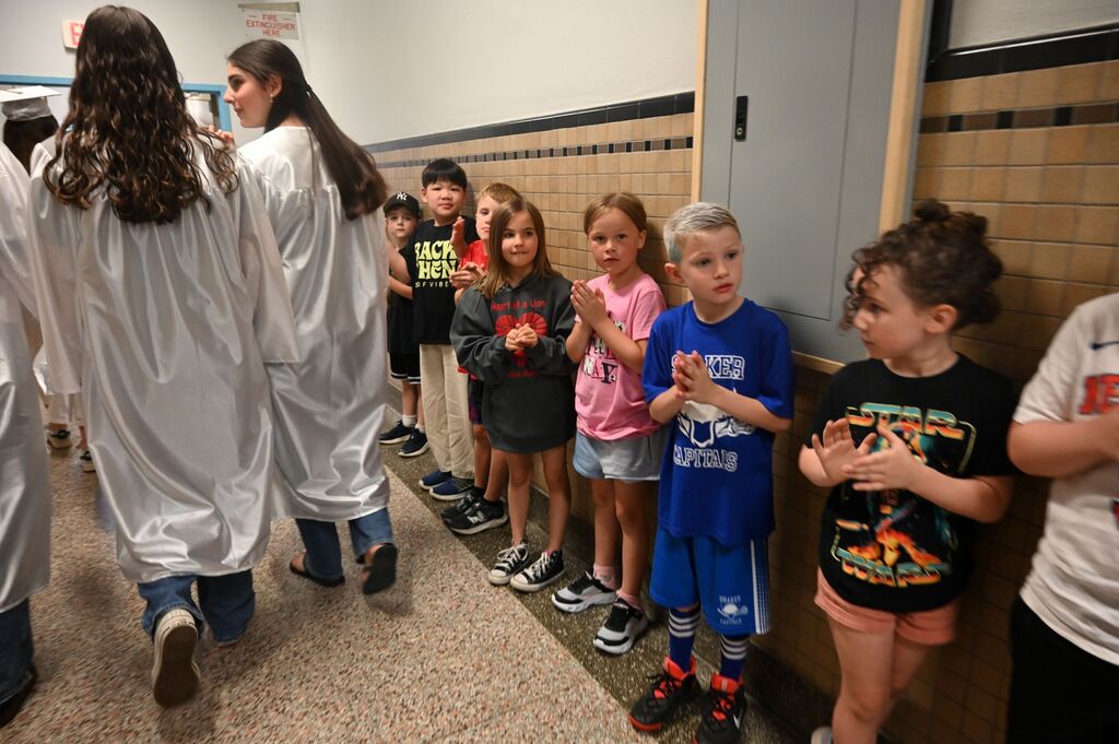 loudvonville students waiting for the seniors to walk through