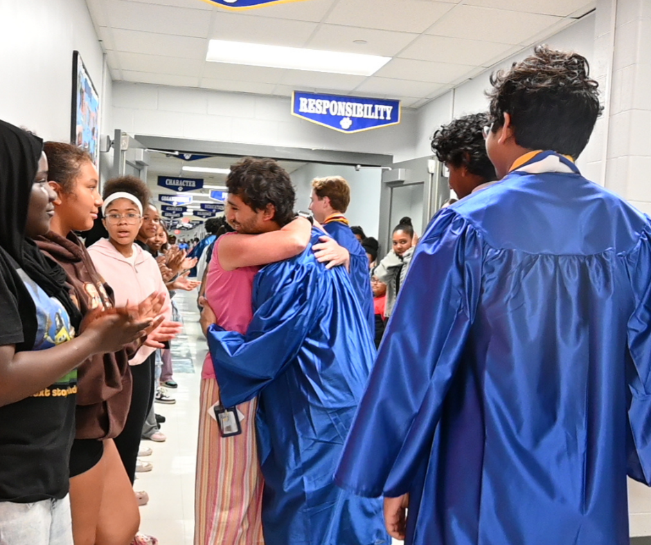 Shaker senior hugs past elementary teacher