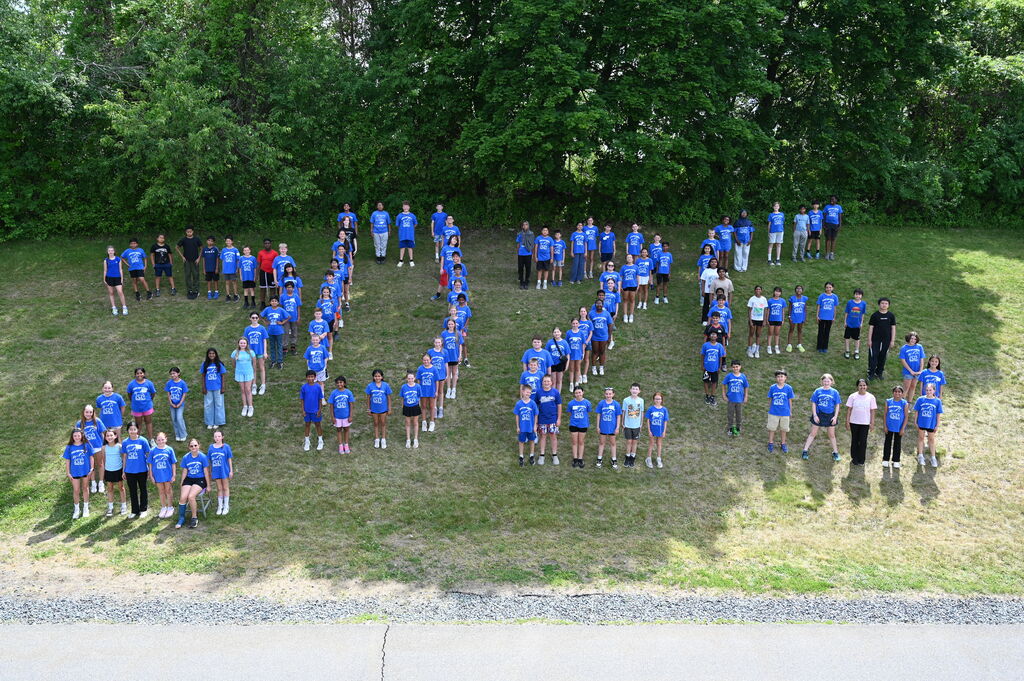 group of students forming a 2026