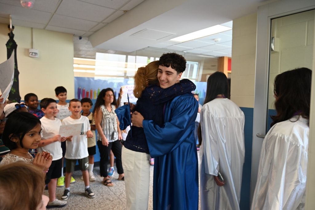 Shaker senior hugs past elementary teacher