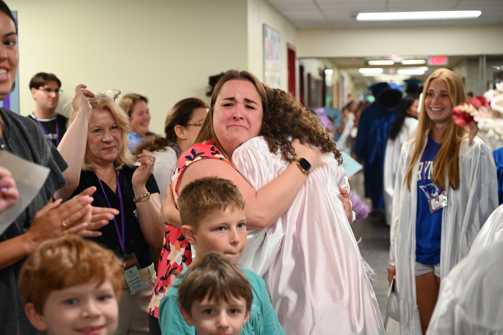 Shaker senior hugs past elementary teacher