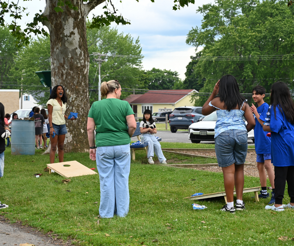 Forts Ferry fifth graders play cornhole