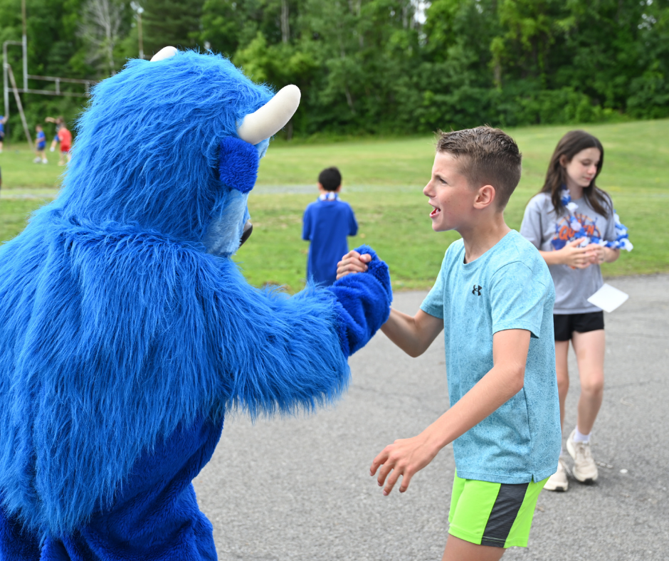 Forts Ferry student high fives Bryson the Bison