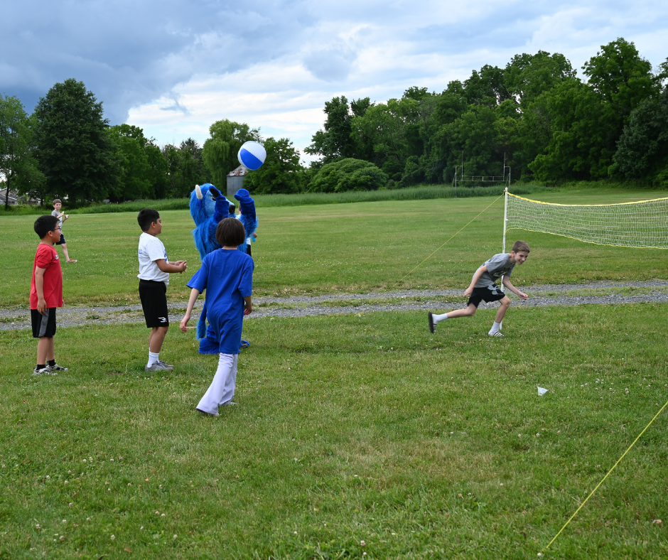 Forts Ferry fifth graders play volleyball with Bryson the Bison