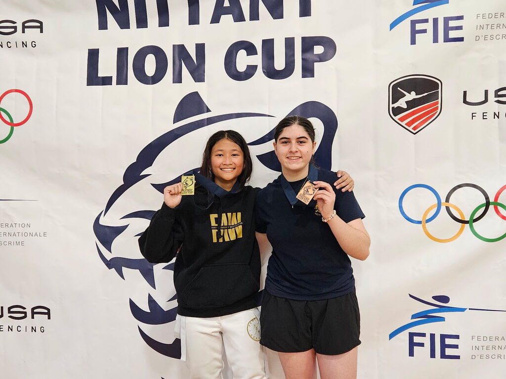 Giuliana with fellow fencer