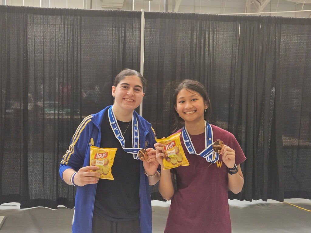 Giuliana with fellow fencer
