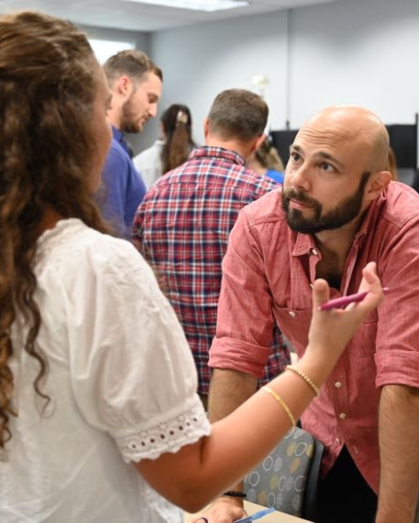 Second year practitioners discuss with one another