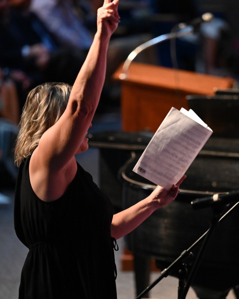 Ms. Brooke Greco conducts students