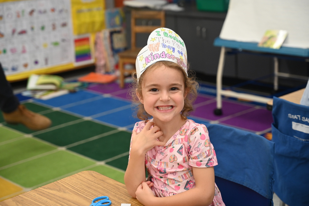 Student smiles for kindergarten