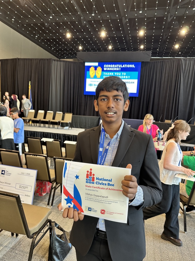 Vibhav Doppalapudi standing with a certificate, after placing in top 5 at civics bee for new york state