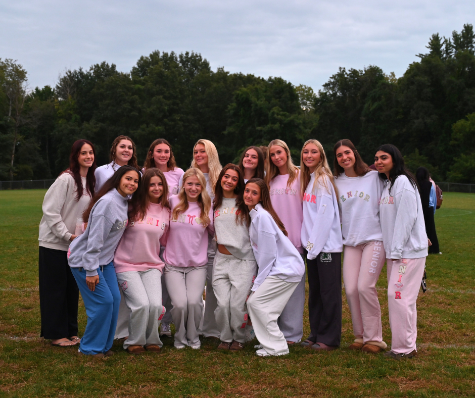 Seniors in front of the sunrise