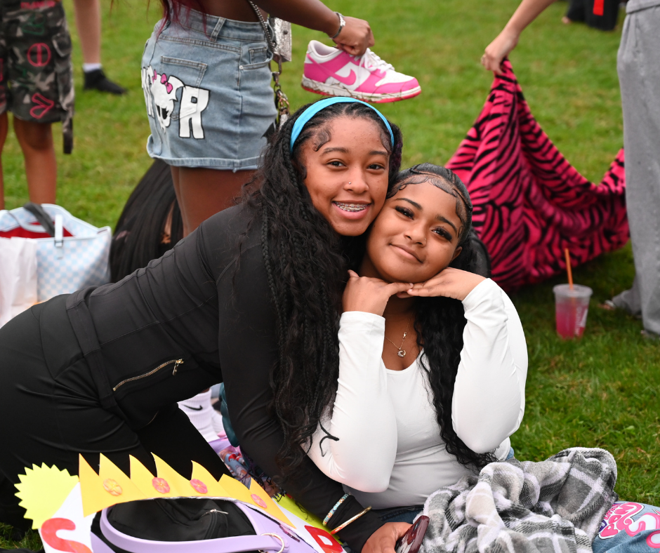 Seniors smiling on a blanket