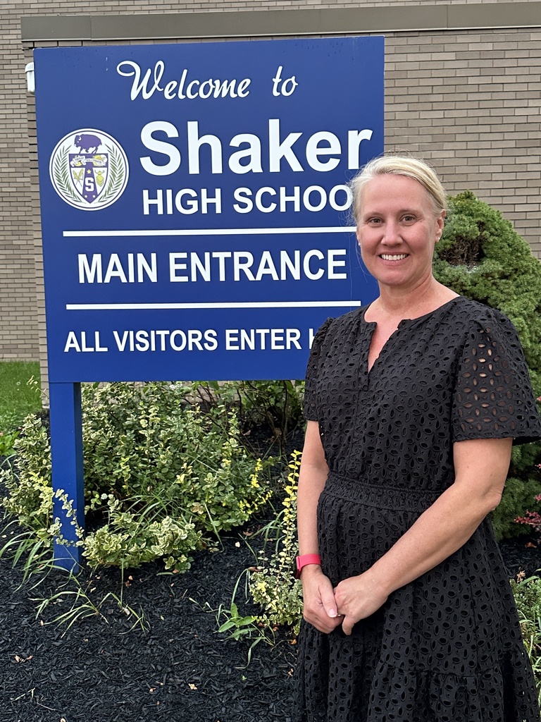 photo of nicky bogert at shaker high school main entrance