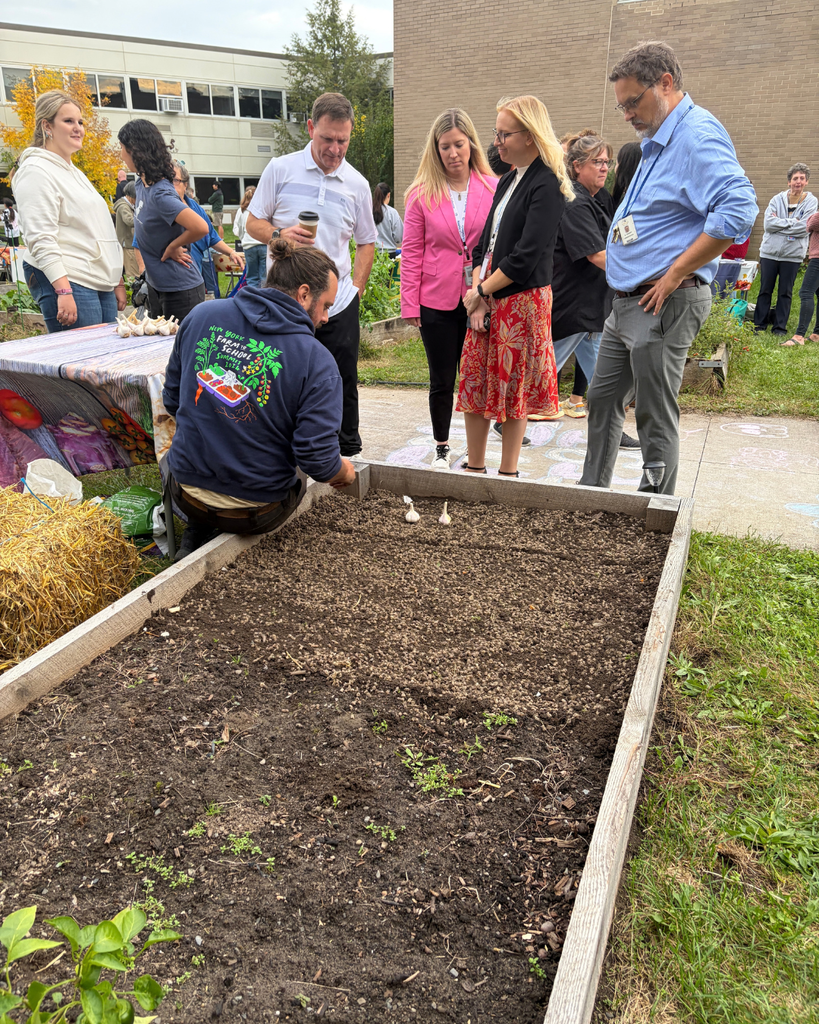 North Colonie admin learn to plant garlic