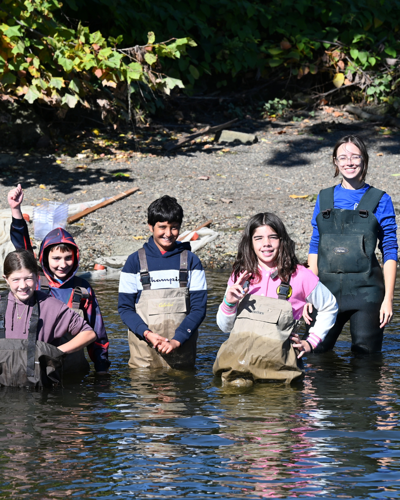 Students wading in Hudson River