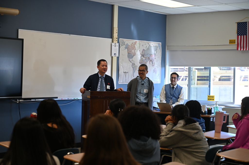 Delegate and translator present to students
