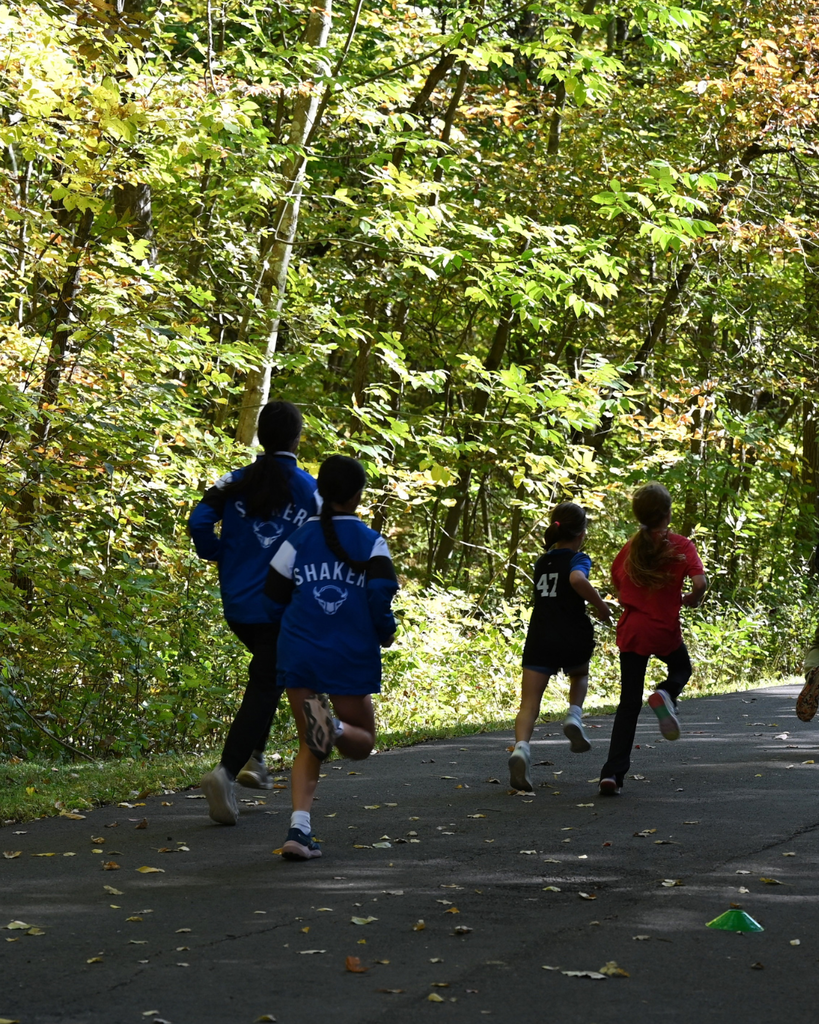 Girls Varsity XC athletes run with students