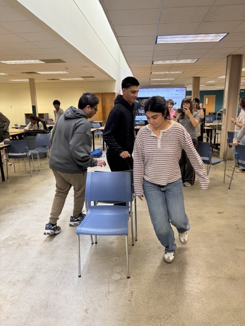 German club dancing together playing musical chairs