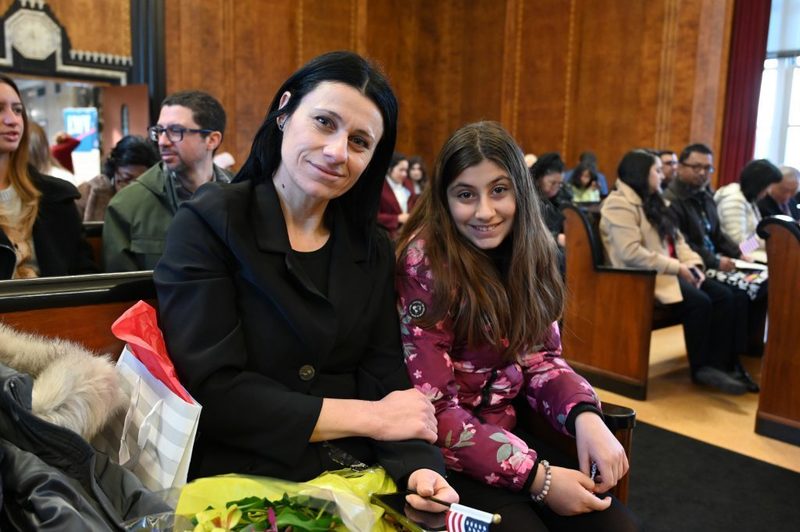 Marianna Kilinkarova Zahopoulos and her daughter Andriana pose before the naturalization ceremony.