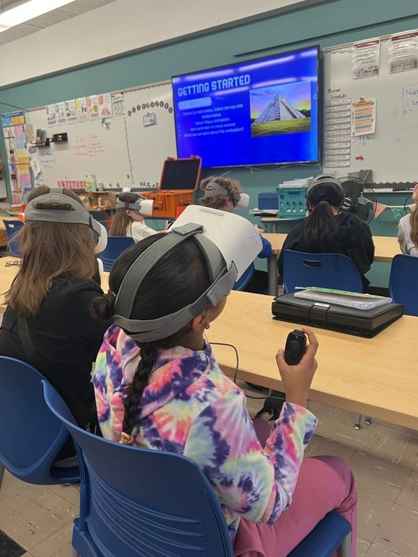 Students in Mrs. Silver’s sixth grade social studies class use virtual reality headsets.