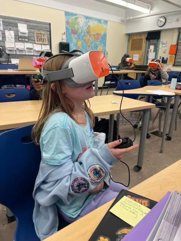 A sixth grade student at Shaker Middle School uses ClassVR as part of a social studies lesson.