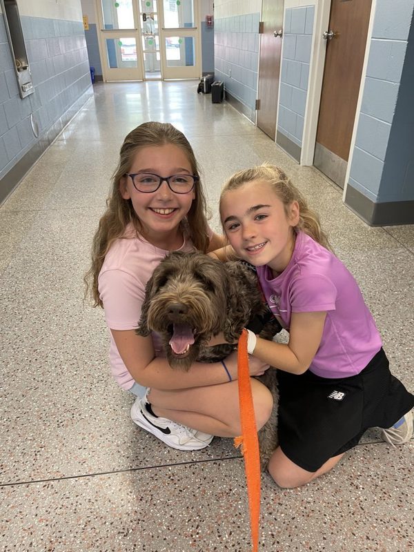 Therapy dog with students