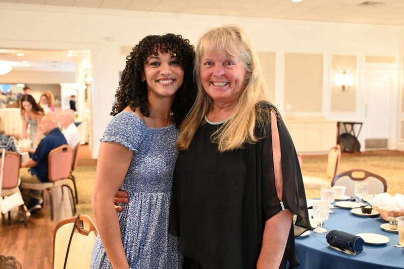 Class of 2024 Shaker Athletic Hall of Fame inductee Nia Joyner celebrates with former Shaker track and field coach Marbry Gansle.