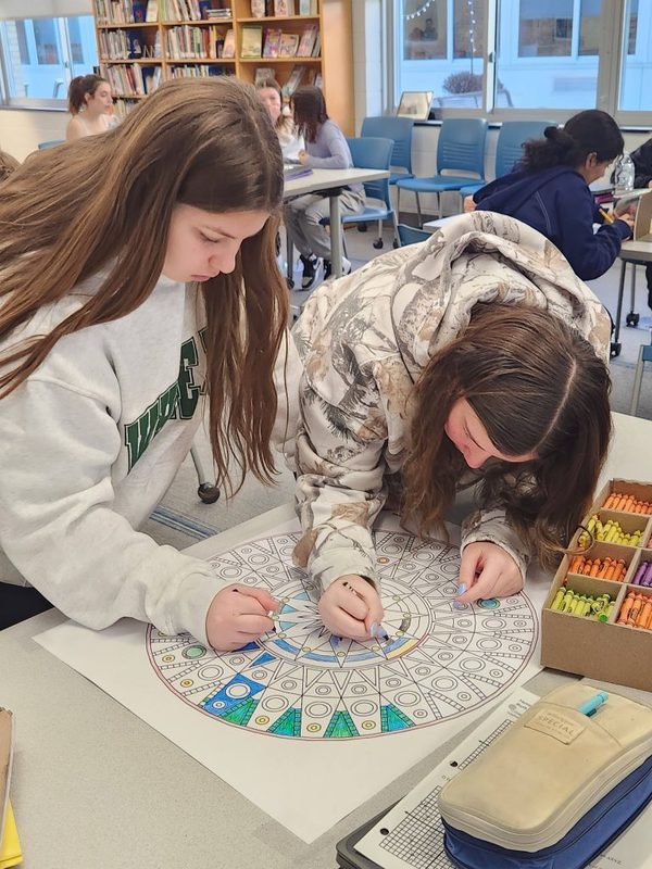 Students color mandalas as part of their math transformation stations at SMS.