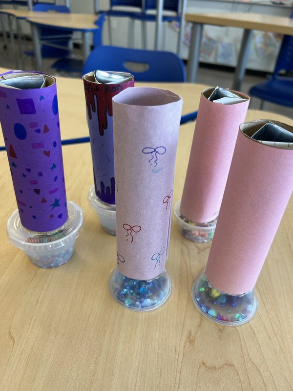 Students created handmade kaleidoscopes in a lesson on reflective art.