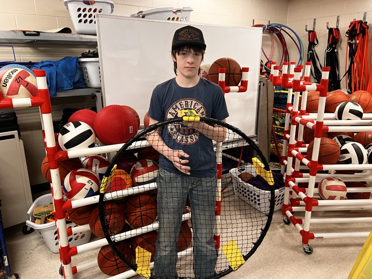 PE equipment room and student 