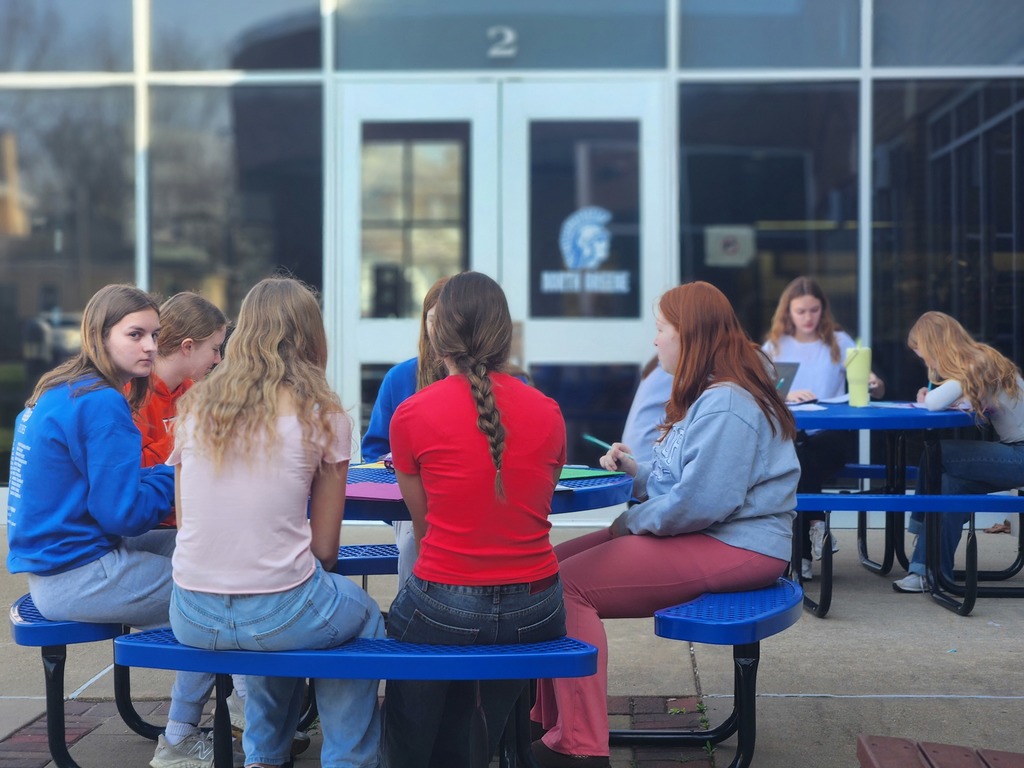 Students from English 9 Honors working on their English homework. 