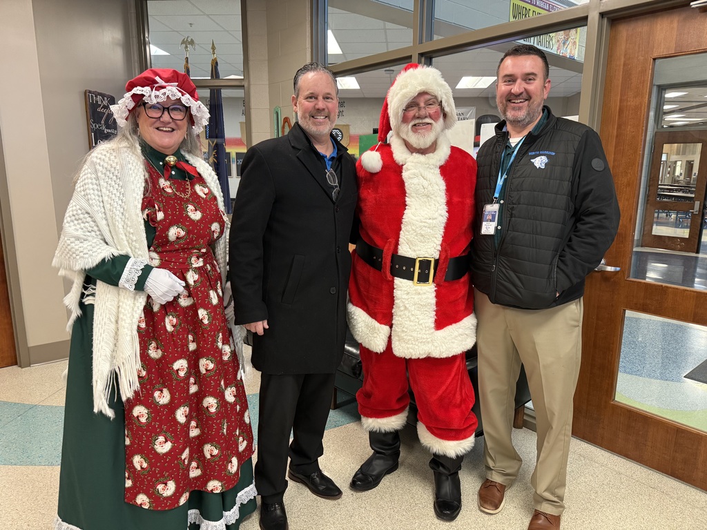 Santa and Mrs. Claus with Mr. LaGrange and Mr. Waynescott