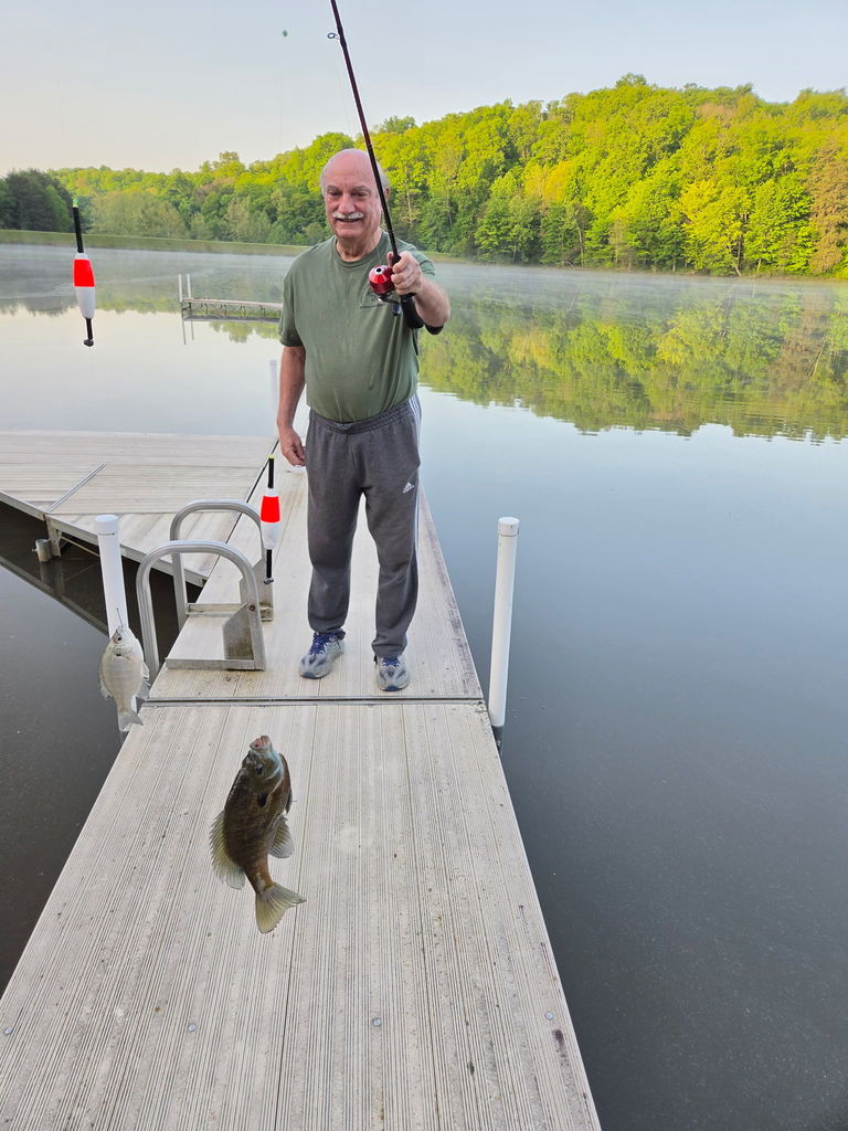 Mr. Schmidt posing a larger bluegill caught from Lake Lilly- Happy Hollow - May 2026