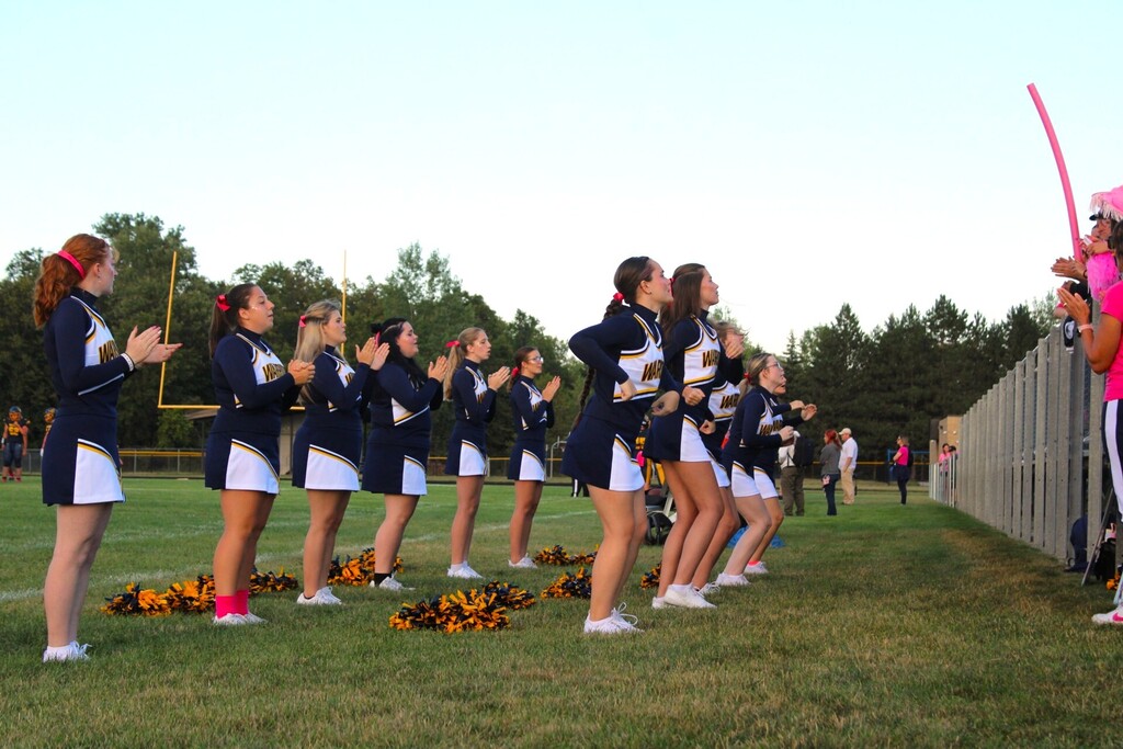 Cheerleaders firing up the crowd
