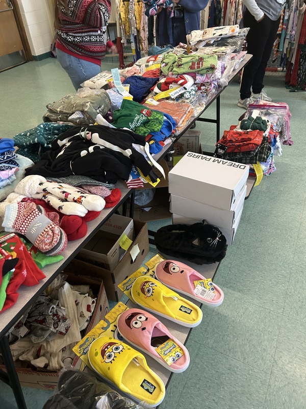 Clothes laid on tables out for pickup