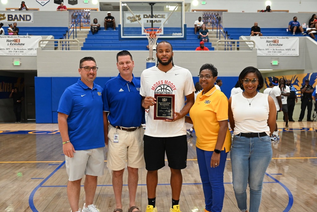 Moses Moody with Coach Bilon, Dr. Gregory Pilewski, Ms. Angela Person-West, and Athletic Employee of the North Little Rock School District