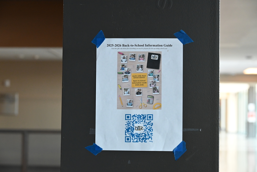 Back-to-School flyer taped on a beam in a building