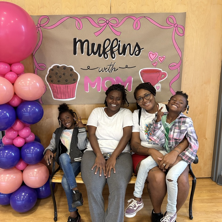 mother and her kids posing