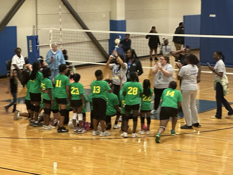 TEAM POSING FOR PICTURE