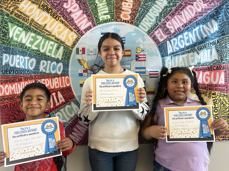 students holding awards