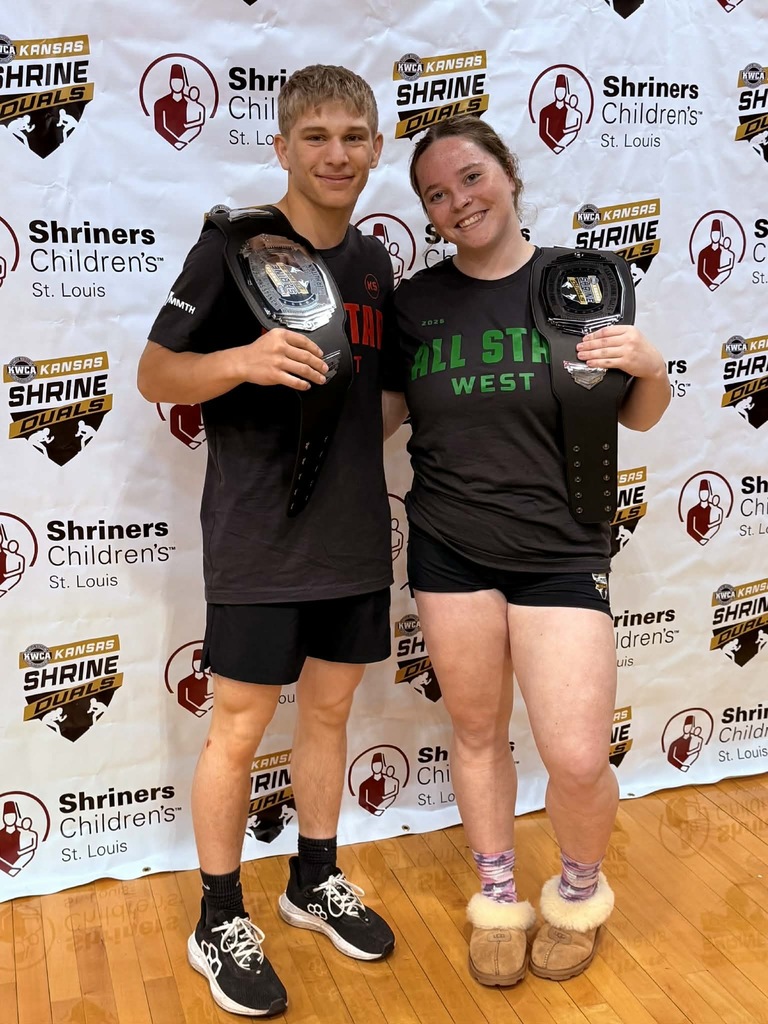 Brenah and Leo with their belt