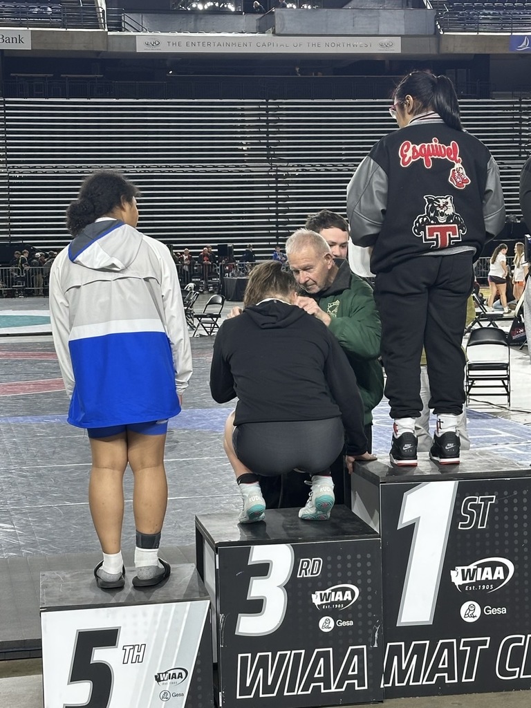 Camrynn Pike getting award from NM Hall of Famer Ed Amick