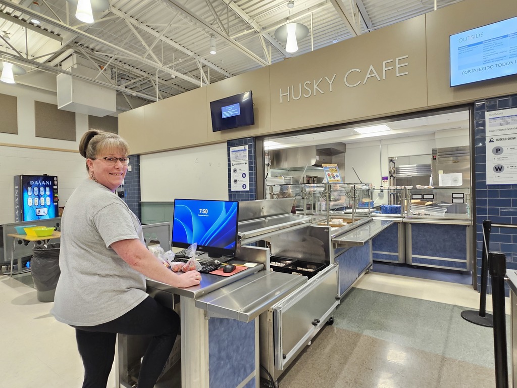 Kitchen staff checking kids out