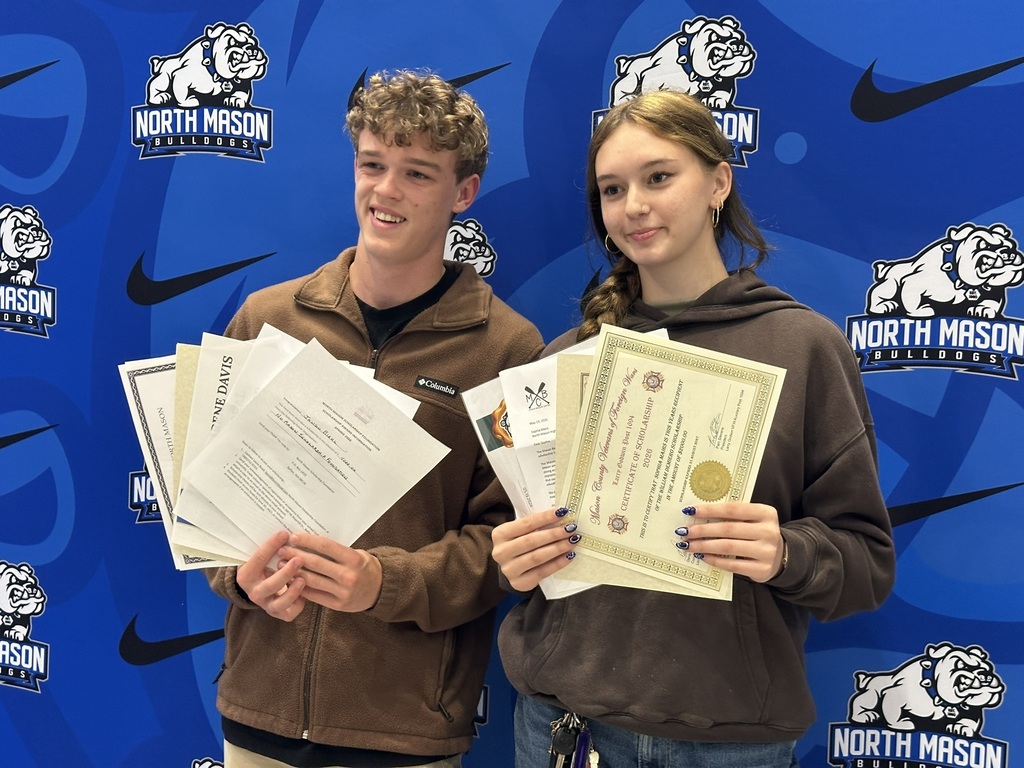 Seniors with their scholarships